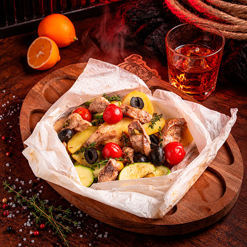 Сом запечёный с овощами